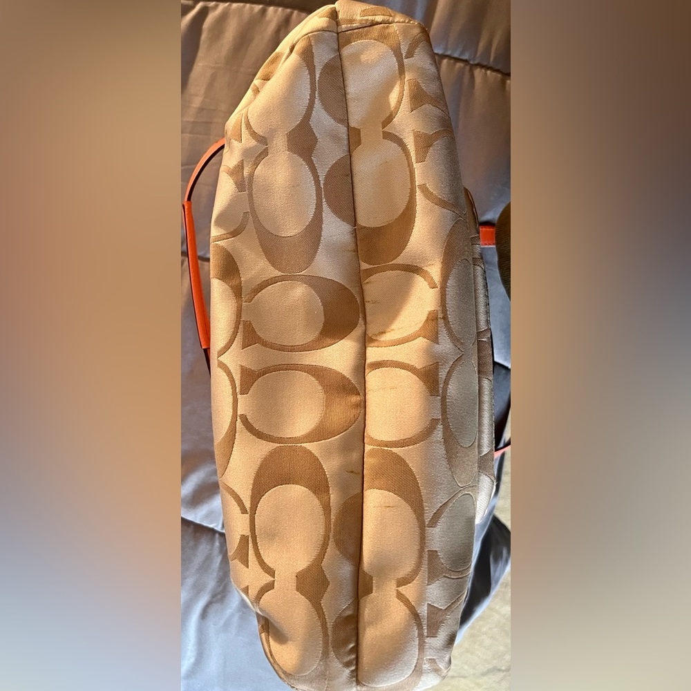 Medium coral and tan Coach bag. Used for 1 night. Basically new! Serial number - Picture 7 of 10